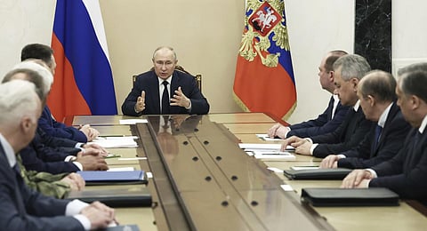 Russian President Vladimir Putin chairs a meeting with the heads of Russian law enforcement agencies at the Kremlin in Moscow. (Photo | AP)