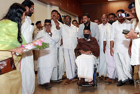 PDP chairman Abdul Nasar Madani who arrived in the state on Monday after six years greets his  party workers who reached the Kochi airport to welcome him. (Photo | T P Sooraj, EPS)