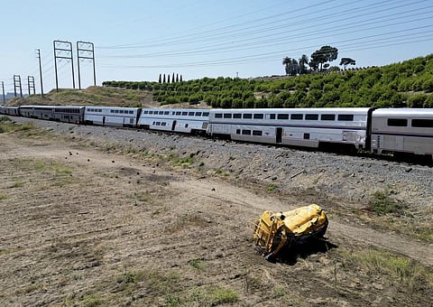 Part of a derailed train that struck a water truck lies on the ground in Moorpark, California, on Wednesday, June 28, 2023. (Photo | AP)