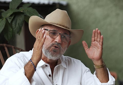 FILE: Hipolito Mora, founder of the state's civilian armed self-defense movement, speaks during an interview at his home in Ruana, Michoacan state, Mexico, Oct 3, 2019. (AP)