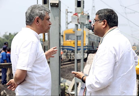 Union Railways Minister Ashwini Vaishnaw and Union Minister Dharmendra Pradhan at the train accident site during its restoration work, in Balasore, Odisha on Sunday. (ANI)
