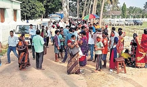 Family members of the deceased passengers outside the school premises | Express