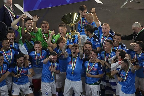 Napoli's players celebrate after winning the Serie A soccer title trophy at the Diego Maradona Stadium, in Naples, Sunday, June 4, 2023. (Photo | AP)