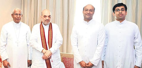 Union Home Minister Amit Shah with Archbishop Andrews Thazhath,  Fr Renny Mundenkurien and Fr Alex Maprani at Nedumbassery on  Sunday | express