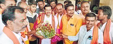 BJP leaders receive Union Minister BL Verma in Warangal on Sunday