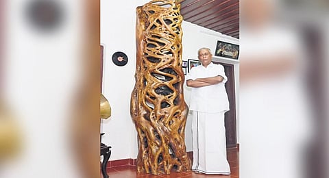 Pius Scaria Pottenkulam with the stuffed Chela tree at his house in Kanjirappally | Vishnu Prathap
