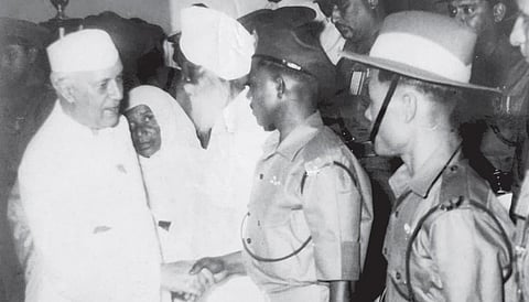 Jawaharlal Nehru shaking hands with Lance Naik Alby D’Cruz | File pic