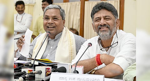 Karnataka Chief Minister Siddaramaiah announces the implementation of Congress’ five guarantees after a cabinet meeting in Bengaluru. ( Photo | Nagaraja Gadekal, EPS)