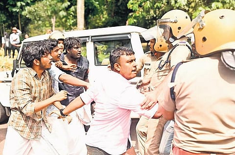 Students protesting in front of Amal Jyothi Engineering College in Kanjirappally, Kottayam, on Tuesday