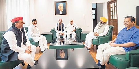 The Delhi CM along with Punjab CM Bhagwant Mann meet SP leader Akhilesh Yadav . (Photo | PTI)