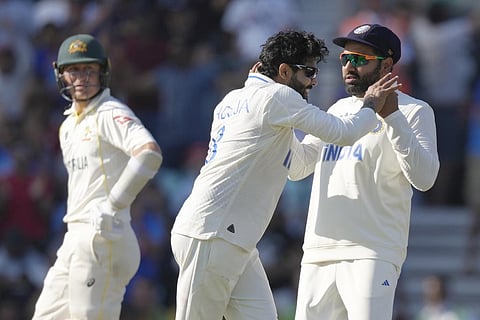 Ravindra Jadeja celebrates after taking the wicket of Travis Head on day three of the ICC World Test Championship Final between India and Australia at The Oval in London, June 9, 2023. (Photo | AP)
