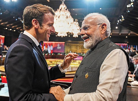 Prime Minister Narendra Modi with France President Emmanuel Macron during a meeting on the sidelines of G20 Summit, in Bali, Indonesia. (Photo | PTI)