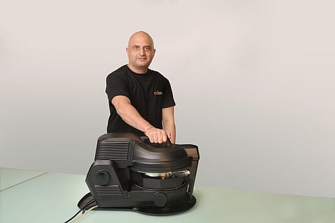 Sanandan Sudhir, founder of On2Cook, a food tech startup that sells a smart cooking device.