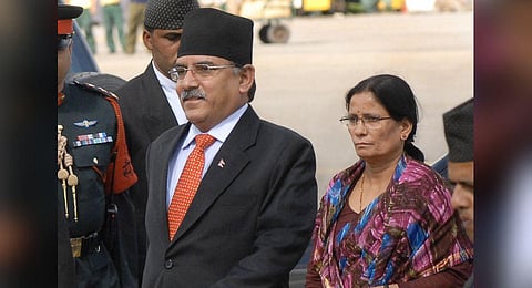 FILE - Nepalese Prime Minister Pushpa Kamal Dahal (L), accompanied by his wife Sita Dahal, arrives at Tribhuvan International Airport in Kathmandu on September 18, 2008. (Photo | AFP)