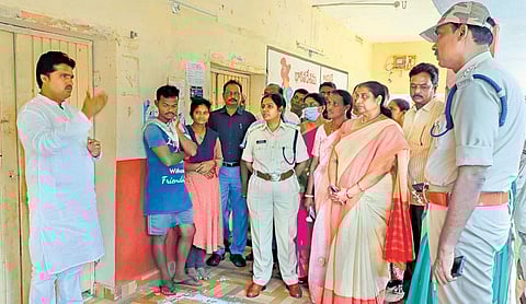 Eluru SP Mary Prasanti and ST Commission member V Somasankar inspecting the ST residential school on Tuesday. (Photo I Express)