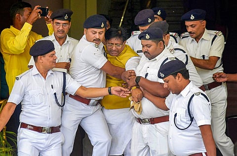 BJP legislator Shailendra being marshaled out of the Bihar Assembly after he staged a protest demanding the resignation of Deputy CM Tejashwi Yadav (Photo | PTI)