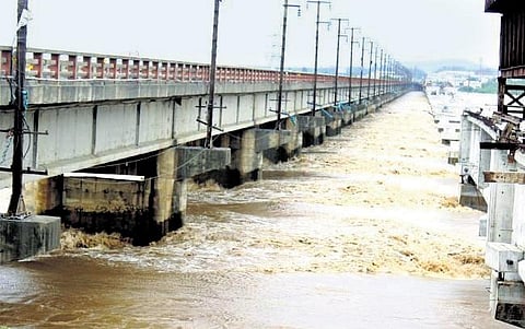 Water flows with great speed under the bridge on Godavari river in Bhadrachalam. (Photo | Express)