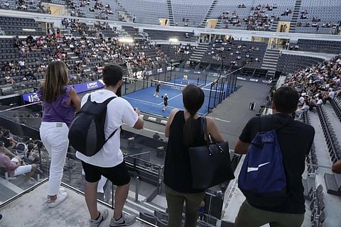 Spectators watch the match between Spainards Juan Lebron, Alejandro  Galan and Antonio Fernandez, Pablo Corona at the Italy Major Premier Padel Tournament in Rome, July 12, 2023. (Photo | AP)