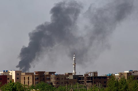 Smoke billows in Khartoum on May 17, 2023, as clashes continue in war-torn Sudan.