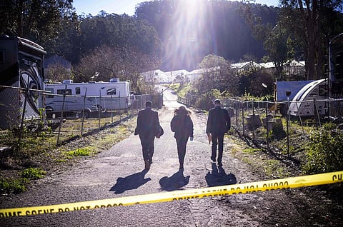 FBI officials at the site of a shooting. (Photo | AP)