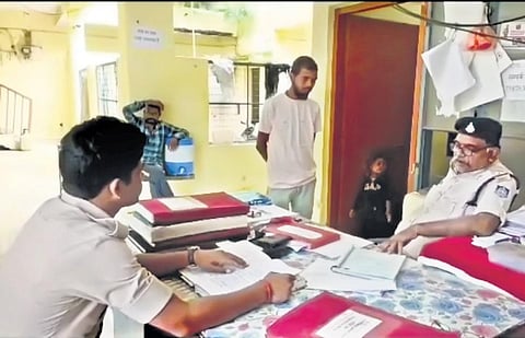 Sanjiv Barman speaking to the cops at Shahdol’s Dhanpuri police station  | Express