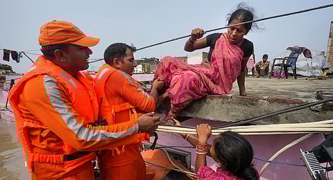 NDRF personnel rescue residents from the flood-affected Old Usmanpur village, in New Delhi, Thursday, July 13, 2023.(Photo | PTI)