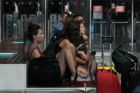 Passengers wait for their flights during a nationwide strike of airports ground staff, and check-in services at Rome's Fiumicino International airport in Fumicino, Italy. (Photo | AP)