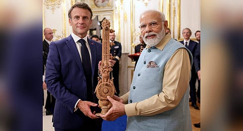 Prime Minister Narendra Modi gifts Sandalwood Sitar to French President Emmanuel Macron, in Paris, Friday, July 14, 2023 (Photo | PTI)
