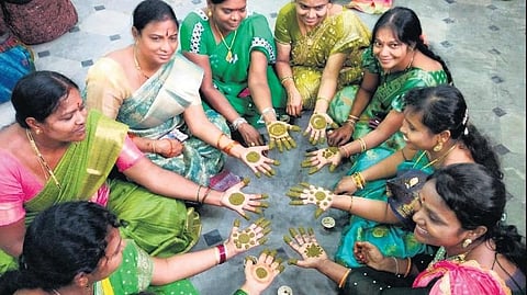 women from the Arya Vaishya community take part in the Gorintaku (mehendi) festival.