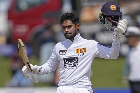 Sri Lanka's Dhananjaya de Silva celebrates his century during the second day of the first test cricket match between Sri Lanka and Pakistan in Galle. (Photo | AP)