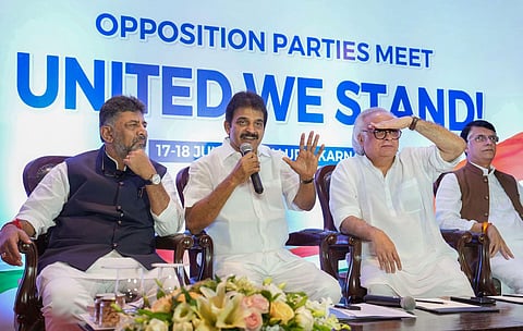 Congress General Secretary KC Venugopal (C) speaks during a press conference ahead of the united opposition meeting, in Bengaluru, Monday, July 17, 2023. (Photo | PTI)