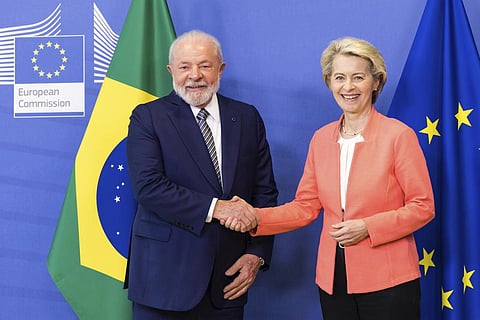 European Commission President Ursula von der Leyen, right, greets Brazil's President Lula da Silva prior to a meeting at EU headquarters in Brussels. (Photo | AP)