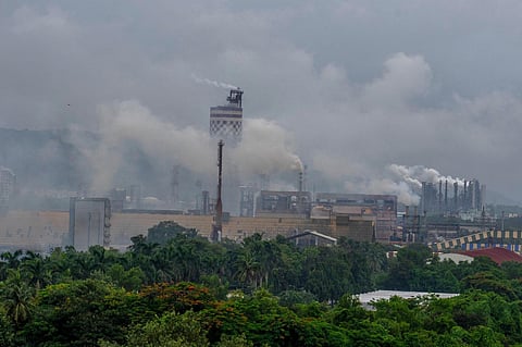 Emissions from a chemical factory fill the skyline on a cloudy day in Mumbai. (Photo | AP)