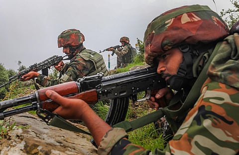 Security personnel during an operation, in Poonch district, Tuesday, July 18, 2023. Four terrorists have been killed in the encounter. (PTI)