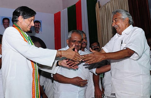 Shashi Tharoor with Oommen Chandy during an election convention in Thiruvananthapuram. (File photo | B P Deepu, EPS)