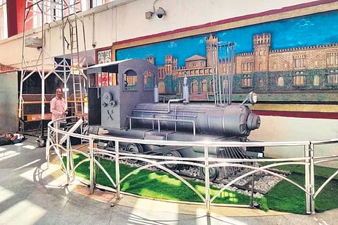 A art installation depicting a train engine, modelled using scrap materials, in the concourse area of the Krantivira Sangolli Rayanna station in Bengaluru | Express