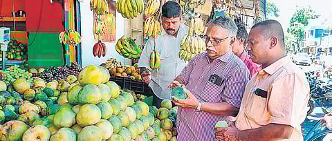 Food safety department officials inspecting mango shops in Karaikal Festival | Express