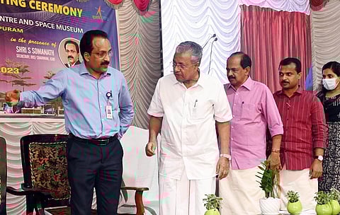 ISRO chairman S Somanath guiding Chief Minister Pinarayi VIjayan to lay the foundation stone for the APJ Abdul Kalam Knowledge Centre and Space Museum at Kowdiar in Thiruvananthapuram on Friday.