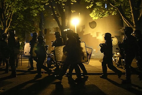 A group of police officers walk during a protest in Nanterre, outside Paris, France, Saturday, July 1, 2023. (Photo | AP)