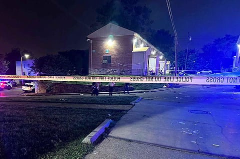 Police tape cordons off the area of a mass shooting incident in the Southern District of Baltimore, Maryland, early Sunday, July 2, 2023. (Photo|AP)