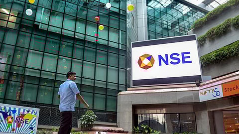 The logo of the National Stock Exchange (NSE) is displayed outside the headquarters in Mumbai, Maharashtra.