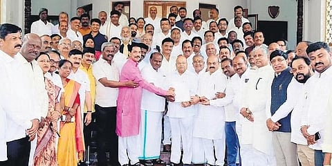 A delegation of BJP and JDS leaders submit a petition to Governor Thaawarchand Gehlot, regarding the suspension of BJP MLAs, in Bengaluru on Thursday | EXPRESS