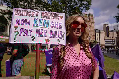 Demonstrators hold placards as they participate in a rally by the UK actors union Equity, in support of the SAG-AFTRA strike, July 21, 2023, in London. (Photo|AP)