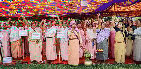 Women shout slogans as they take part in a demonstration against ongoing violence in Manipur, in Imphal (Photo | PTI)