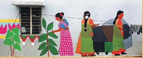 Murals created by women slum dwellers. They meet weekly to discuss various issues that they highlight through their art