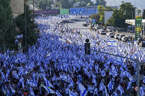 Thousands of Israelis march to Jerusalem in protest of plans by Prime Minister Benjamin Netanyahu's government to overhaul the judicial system, in Jerusalem, Saturday, July 22, 2023. (Photo |AP)