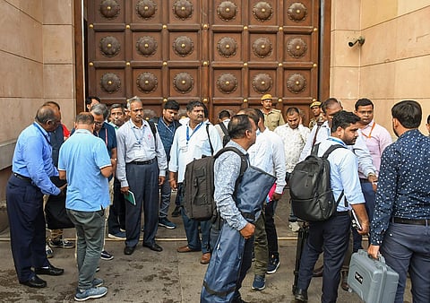 Members of the Archaeological Survey of India (ASI) upon their arrival at the Gyanvapi Mosque complex to conduct a scientific survey, in Varanasi, Monday, July 24, 2023. (PTI)