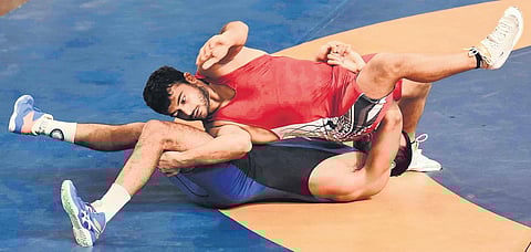 Deepak Punia (in Red) of SSCB and Deepak of SSCB compete in the 86kg at the trials for Asian Games in New Delhi on Sunday | Parveen Negi