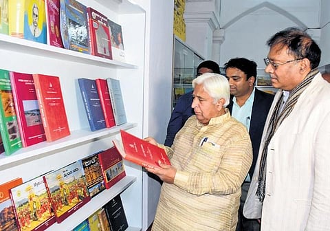 Tourism Minister HK Patil takes a look at exhibiuts kept at the strongroom at Mysuru palace on Monday | Udayashankar S