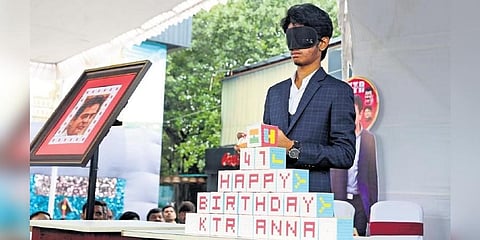 Affan Kutty creates a KTR portrait with Rubik’s cubes during celebrations held at the Thrill City on Necklace Road in Hyderabad on Monday | Sri Loganathan Velmurugan